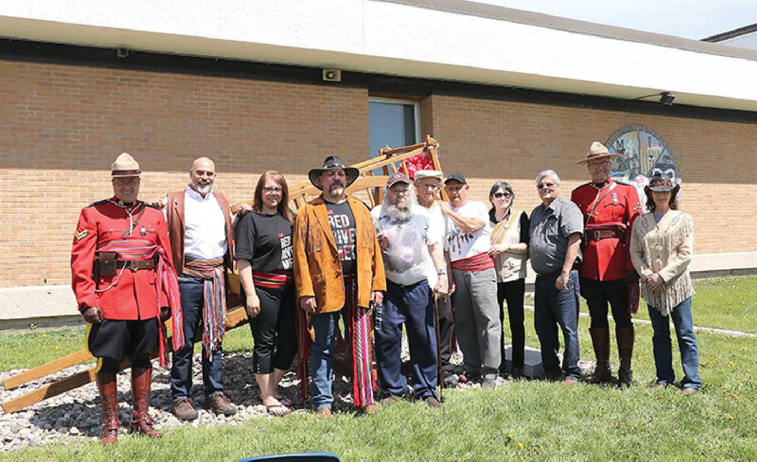 Prairie Mountain RCMP, Manitoba Mtis Federation officials, Jerome Cartworks and a few elders from the community came together for the unveiling of the Red River cart at cole Saint-Lazare, on May 27 in St. Lazare, Manitoba.